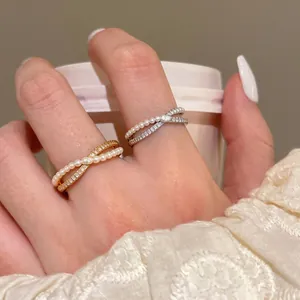 Elegant French retro zircon crossover pearl rings displayed on a woman's index finger