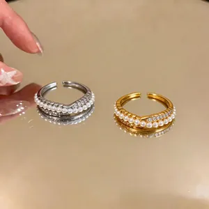 Elegant French vintage style crossover zircon and pearl open rings in gold and silver finishes