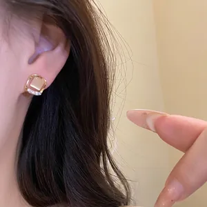 Elegant vintage rhombic cat's eye stud earrings with silver needle and diamond inlay
