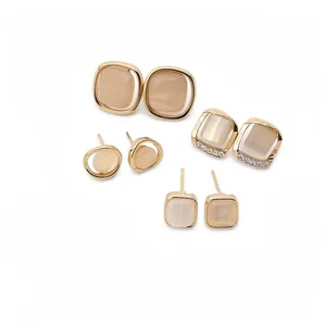 Elegant gold cat-eye stone earring set with diamond accents in French retro style