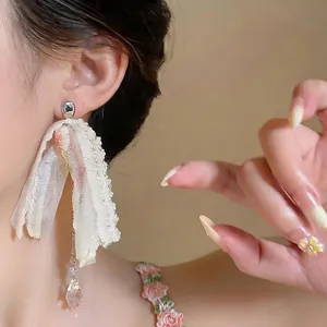 Elegant lace flower teardrop tassel earrings for a fairy-tale vacation style look