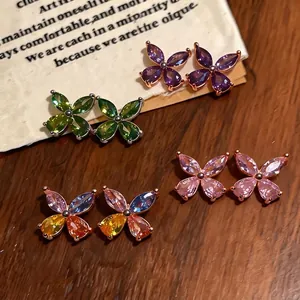 Elegant zircon teardrop flower stud earrings in multiple colors for a stylish look