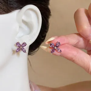 Elegant purple zircon flower stud earrings with a delicate minimalist aesthetic