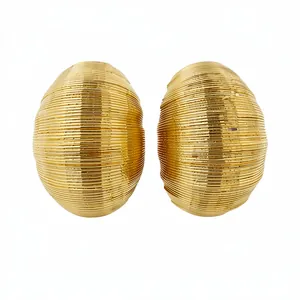 Elegant gold textured oval stud earrings with minimalist ribbed design for women
