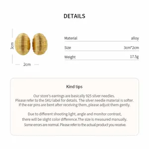 Detailed view of textured gold oval stud earrings with 3cm height and alloy specs