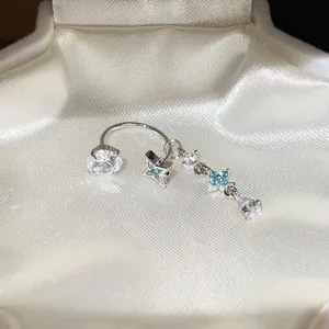 Silver star and flower dangling earring with blue and clear zircon in gift box