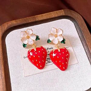 Exquisite strawberry flower drop earrings with red enamel finish and white petals