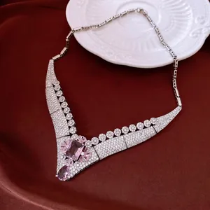 18k gold plated necklace featuring pink square and teardrop gems with zircon pavé detail