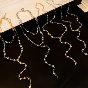 Eleganti collane a Y a doppio strato con cuore, finiture oro e argento.