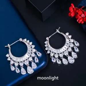 Elegant silver hoop earrings featuring clear cubic zirconia teardrop fringe drops