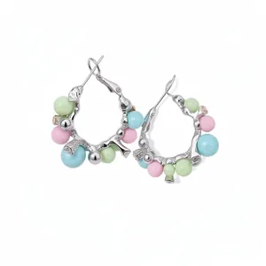Stylish silver hoop earrings with colorful pastel beads and delicate sparkling crystals.