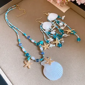 Summer vacation style jewelry set featuring blue beads, shells, and starfish charms