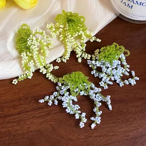 Handmade beaded flower tassel earrings in green and blue French pastoral style for women