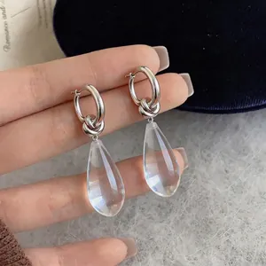 Minimalist silver pin C-shape earrings with clear resin water drop pendants
