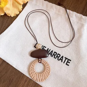 Vintage ethnic style long necklace with irregular ring pendant and adjustable brown cord