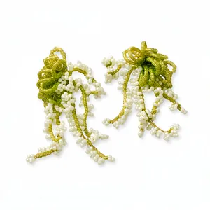 French pastoral style beaded tassel earrings with green glass and white pearl accents.