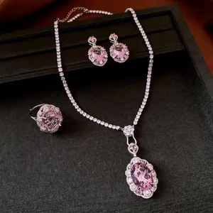 Vintage Schmuckset mit rosa Zirkonia: Halskette, Ohrringe und verstellbarer Ring