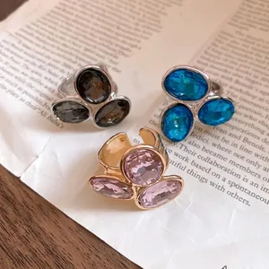 Vintage style oval rhinestone open rings for women featuring blue and pink crystals