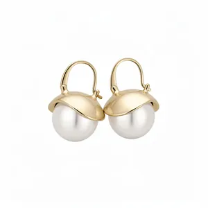 Elegant French-style gold-plated pearl hoop earrings with drip oil design.