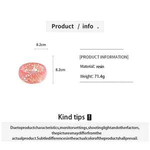 Close-up of pink resin bangle showing product specifications material and 8.2cm dimensions