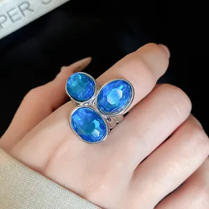 Vintage adjustable open ring with three blue oval rhinestones for fashion jewelry