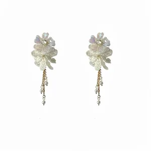 Elegant French style floral tassel earrings with pearls and iridescent petals