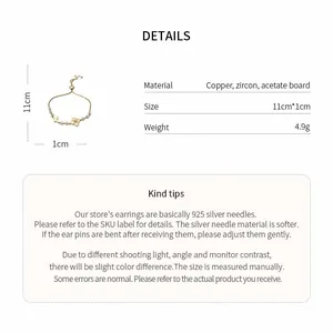 Detailed view of flower and butterfly zircon bracelet with material and size specifications