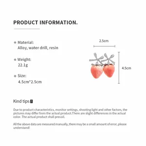 Detailed dimensions and material specs for strawberry earrings with crystal bows.
