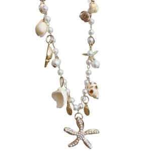 Elegante collana con stella marina, perle e conchiglie per uno stile da spiaggia