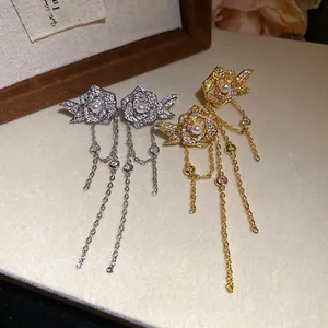 Elegant 18K gold plated flower tassel earrings with pearls and shimmering zircons