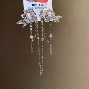 Elegant 18K gold plated rose tassel earrings featuring pearls and sparkling zircons