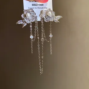 Exquisite 18K gold plated flower drop earrings with pearls and zircon tassels detail