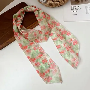 Detail view of the elegant floral mesh scarf necklace in a romantic pastoral style.