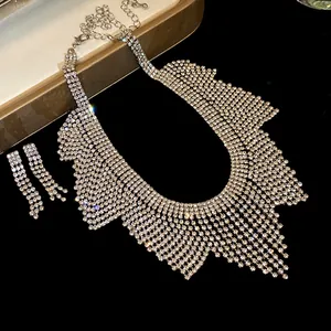 Detailed macro view showing the sparkly rhinestone fringe of the necklace and earrings set