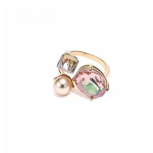 Elegant vintage open ring featuring oval pink crystal, square gem and pearl in gold finish