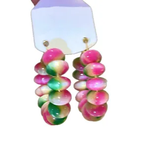 Stylish vibrant pink and green gradient beaded hoop earrings for a chic summer look.