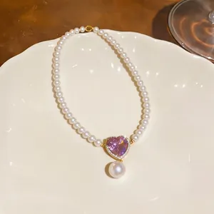 Elegant French vintage heart zircon and pearl beaded necklace with gold finish.