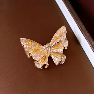 Elegant 18k gold plated butterfly brooch with sparkling crystals and vintage design