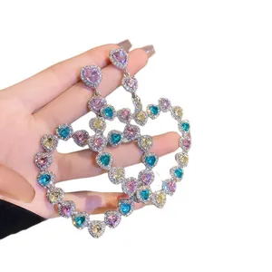 Exaggerated colorful heart-shaped dangle earrings paved with sparkling crystals for women