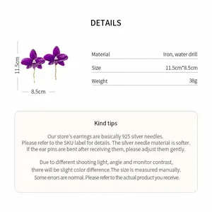 Detailed view of oversized purple flower earrings with crystal accents and dimensions.