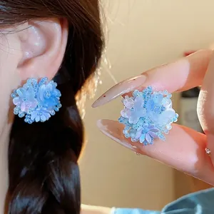 Boucles d'oreilles fleurs en perles de verre bleues au design élégant style dopamine