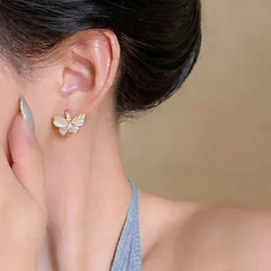 Boucles d'oreilles papillon élégantes avec zircon brillant et pierre œil de chat.