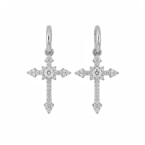 Elegant silver-colored cross dangle earrings with sparkling cubic zirconia crystals.