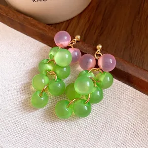 Vibrant green and pink resin beaded drop earrings with silver needles for summer style