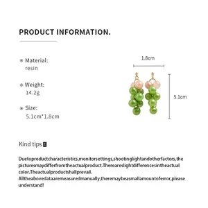 Detailed specifications for green resin grape cluster drop earrings with pink accents.