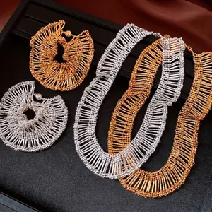 Elegant retro pleated lace jewelry set featuring gold and silver metallic bead necklaces and bracelets