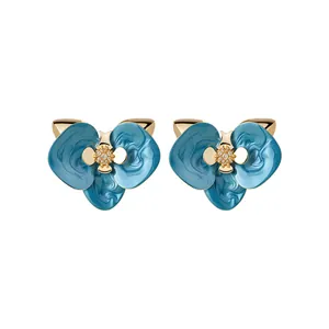 Vintage-Ohrstecker blaue Emaille-Blumen mit goldenen Strass-Mitten