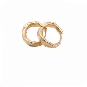 Elegant 18k gold plated hoop earrings with a unique and stylish textured wrinkled design.