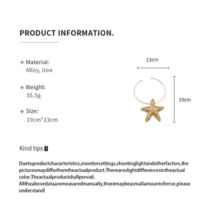 Product info detail showing material, weight, and dimensions of a gold starfish necklace.