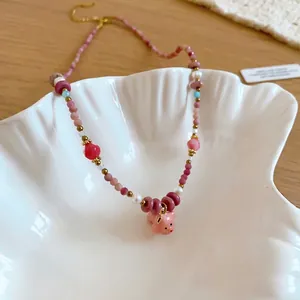 Summer dopamine style pearl necklace featuring a cute pink ceramic pig animal pendant